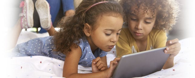 Boy and girl using SpellingCity