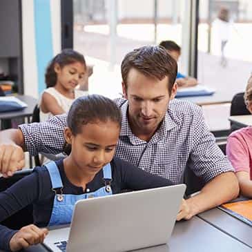 special education teacher and student